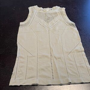 Athleta tank. Size XS. Eyelets all over.